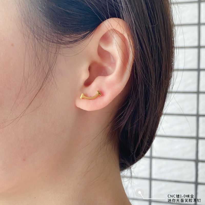 T*f*ny earrings